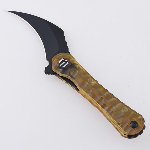 Shieldon Scythe Folding Knife 2.92" Titanium Coating 154CM Steel Hawkbill Point Blade with Amber PEI Transparent Handle & Reversible Wire Pocket Clip